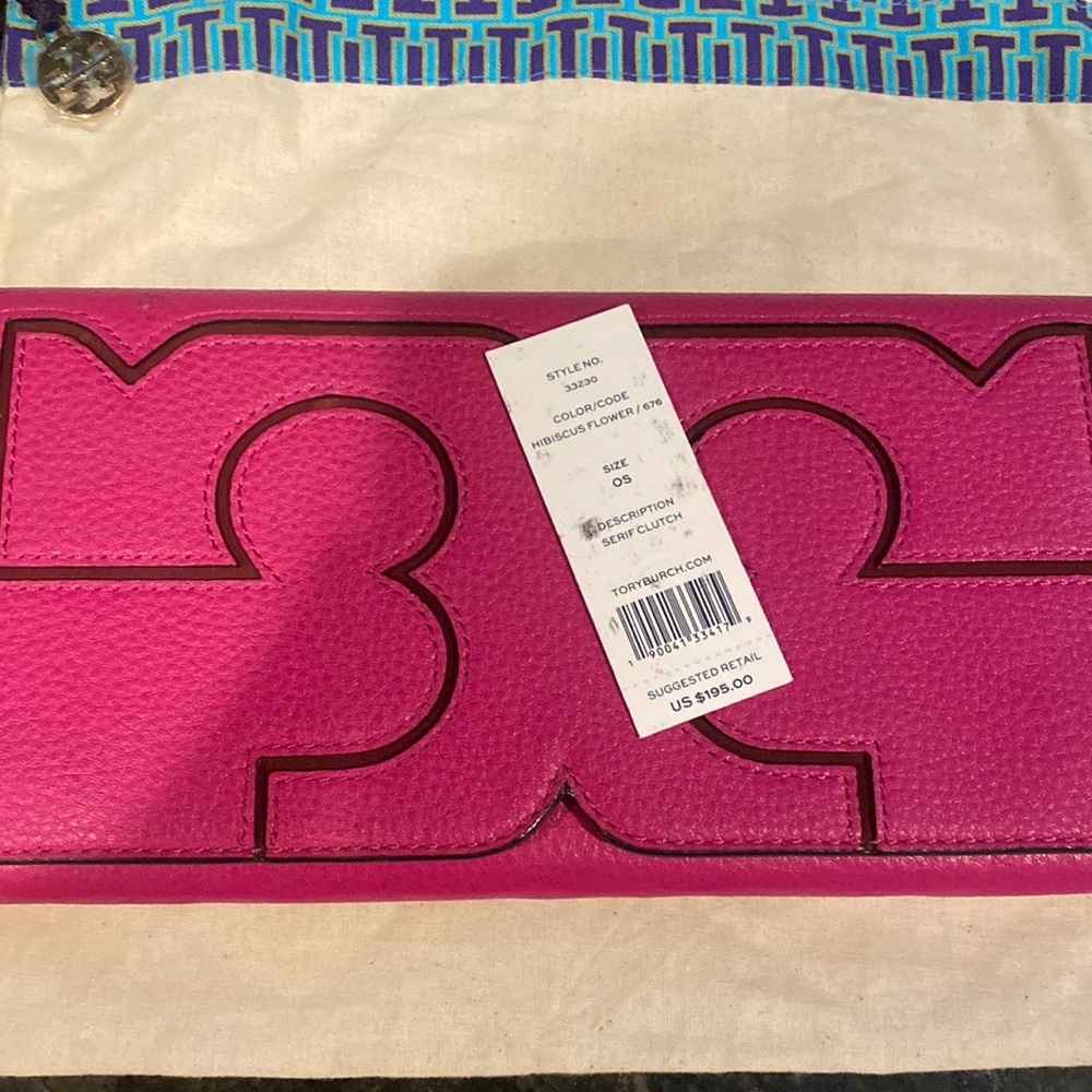 New Tory Burch Serif Clutch. Never been used!!!!